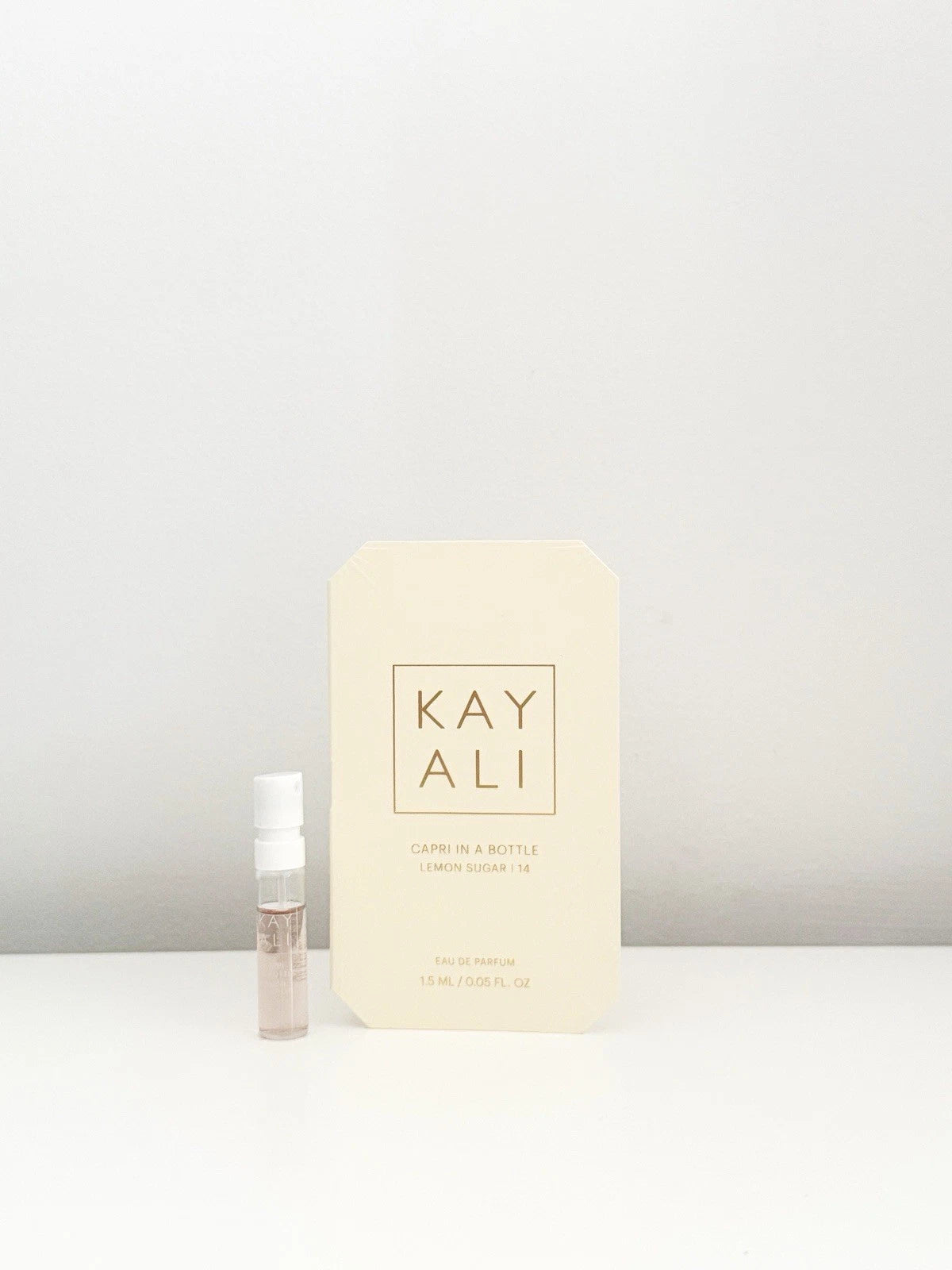 KAYALI Capri In a Bottle Lemon Sugar 14 EDP / Sample (1.5ml) - Rozalinda
